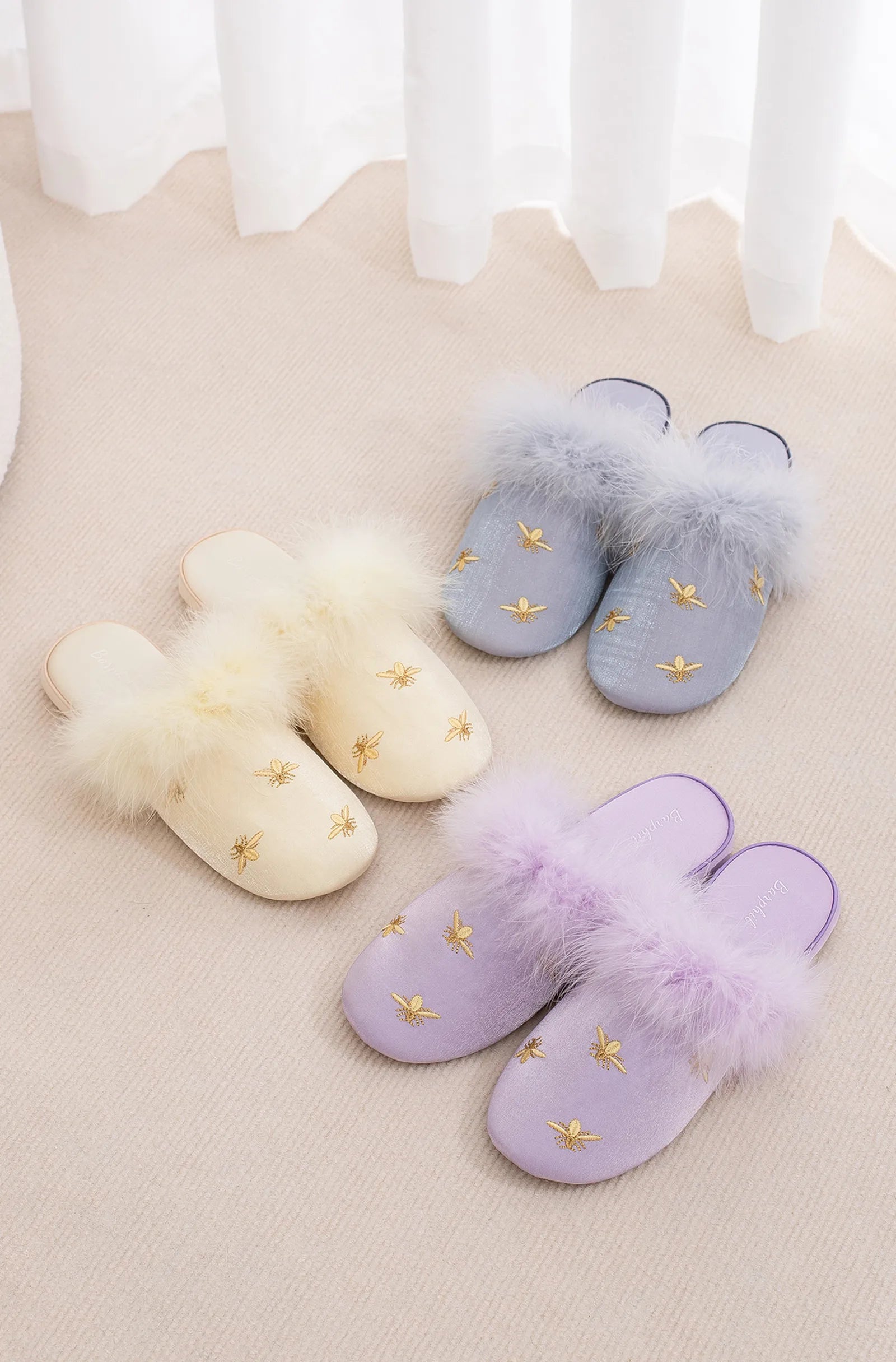Group shot of Blue, Beige, and Purple fluffy embroidered bee slippers - RoomDen