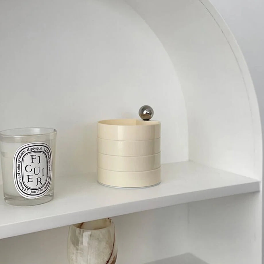 Side view of the stacked Creamy Beige jewelry organizer, showing its clean cylindrical shape. - RoomDen