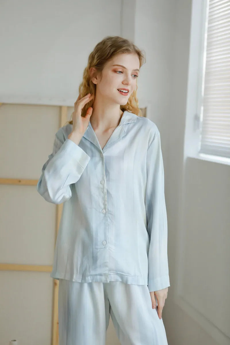 Woman wearing Ice Blue Striped Pajama Set looking away - RoomDen