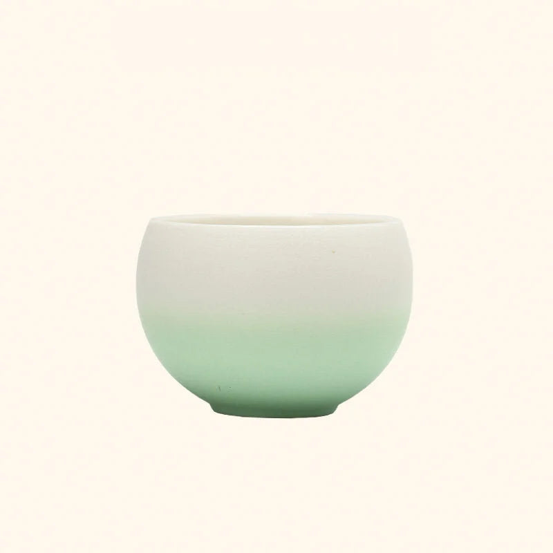 Front view of the Mint Green Ombre Ceramic Cup, showing the white to green gradient. - RoomDen