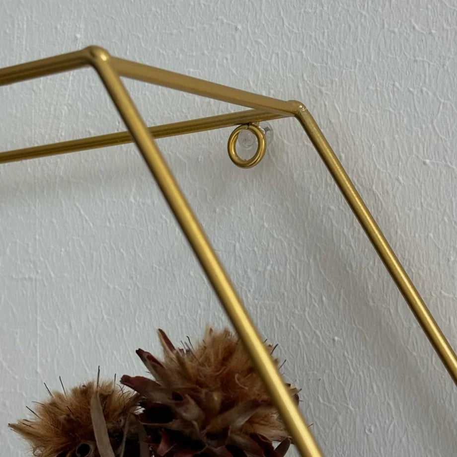 Detail of the mounting ring on the top of the Gold Geometric Hexagon Wall Shelf - RoomDen