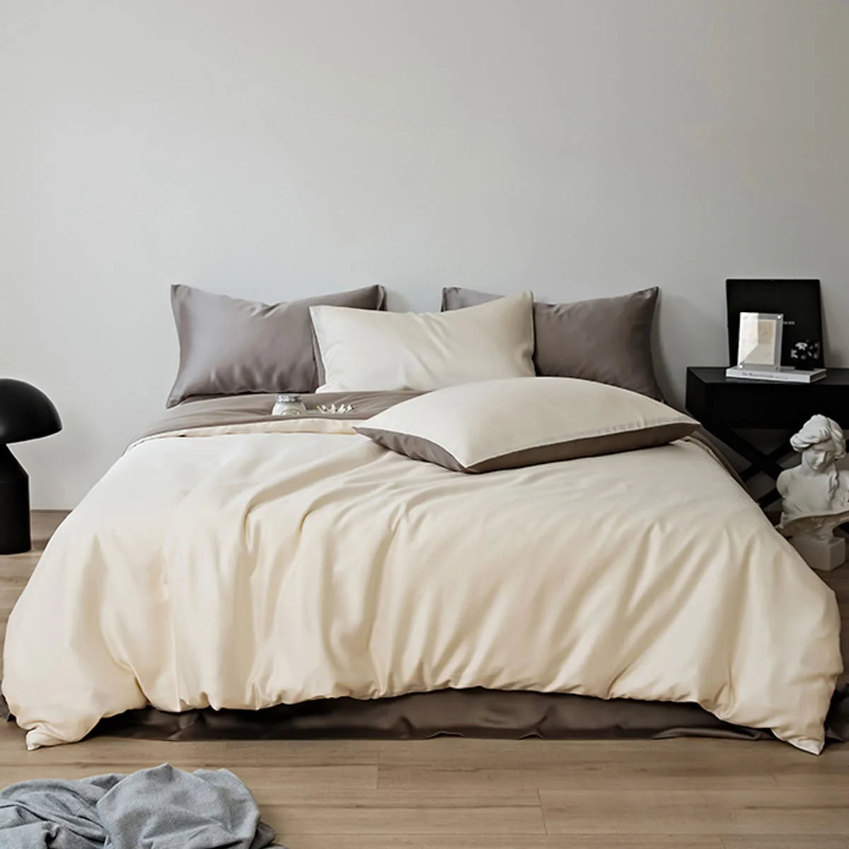 Silky Smooth Cooling Tencel Bedding Set in Cream & Taupe, full view on a bed with modern decor - RoomDen.