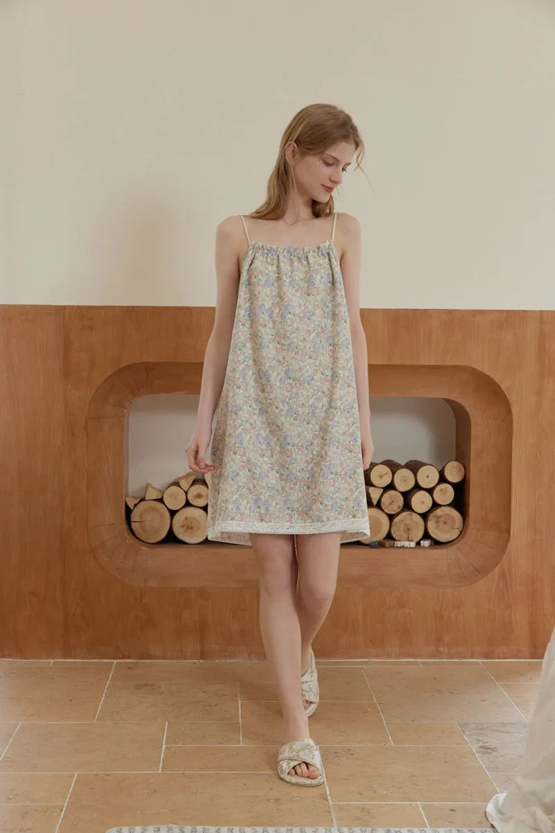 RoomDen Soft Ditsy Floral Washed Cotton Slip Pajama - Model walking showing fabric movement