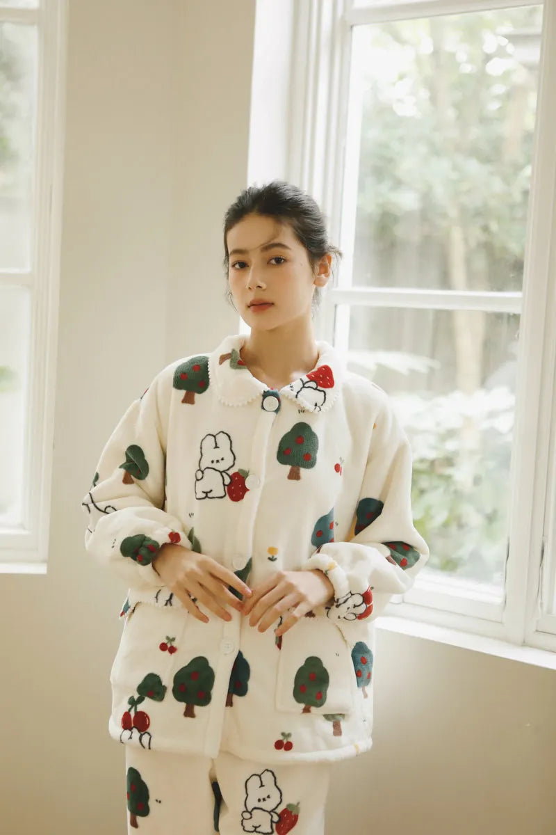 Close-up of Plush Fleece Texture on Button Down Pajama Top with Strawberry Motif