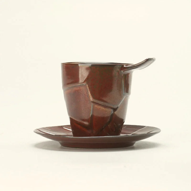 The Russet Brown Textured Geometric Ceramic Cup and Saucer Set against a white background - RoomDen