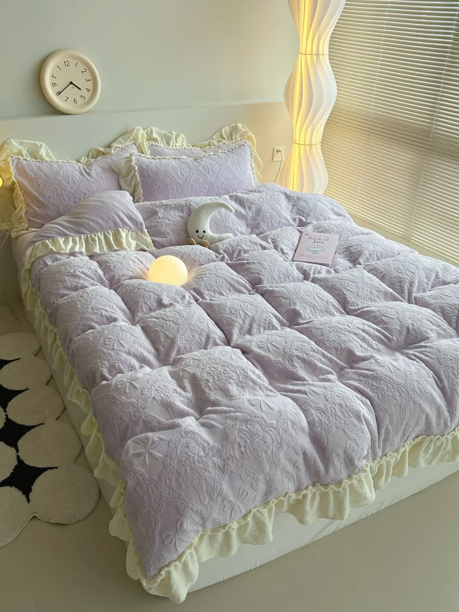 Cozy light purple fleece bedding styled with moon plush and glowing bedside lamp - RoomDen