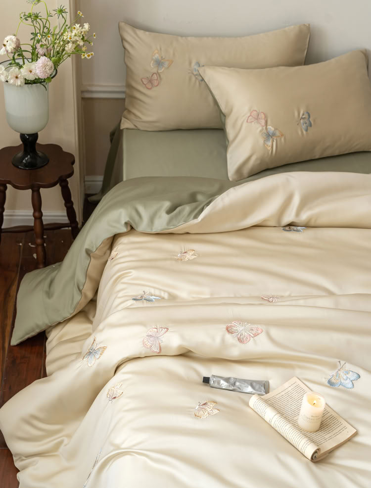 Light luxury butterfly embroidered Lyocell bedding set on wooden floor - RoomDen