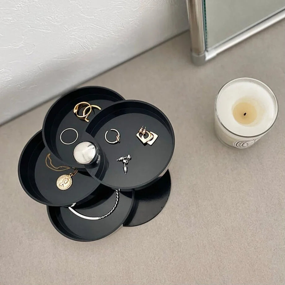 Top-down view of the open Matte Black jewelry organizer, showcasing storage for rings, earrings, and necklaces. - RoomDen