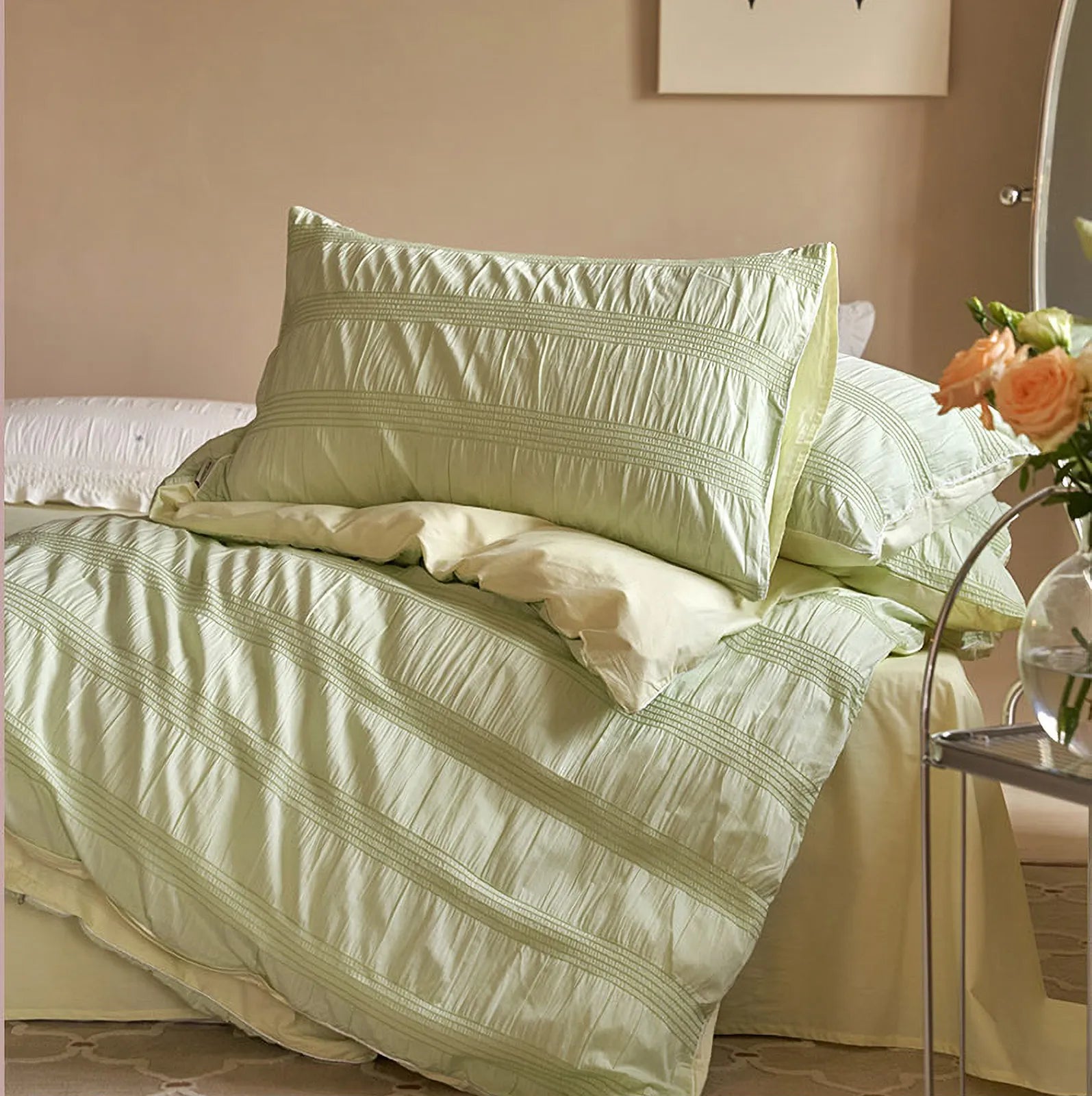 Textured Pintuck Washed Cotton Bedding Set in Pistachio Green on a neatly made bed. - RoomDen