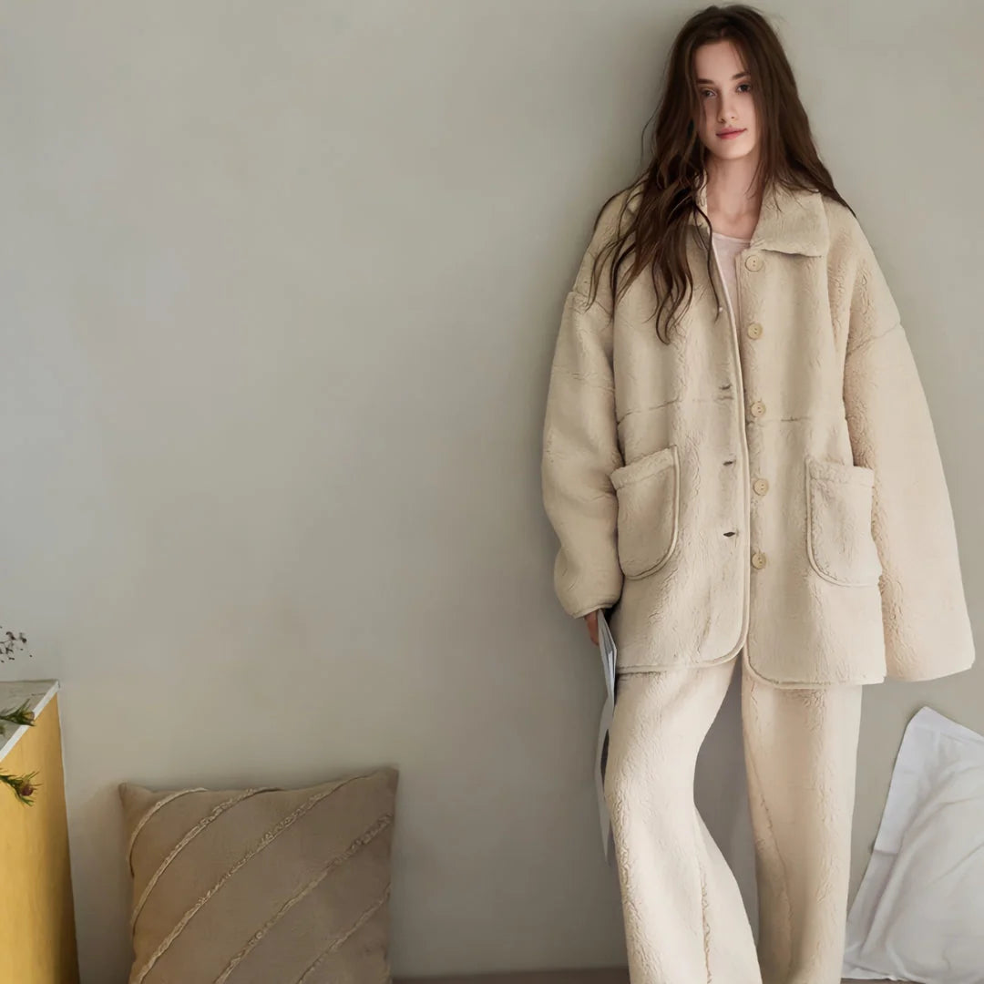 Model standing against a neutral wall in the full Creamy Beige Sherpa Pajama outfit - RoomDen.