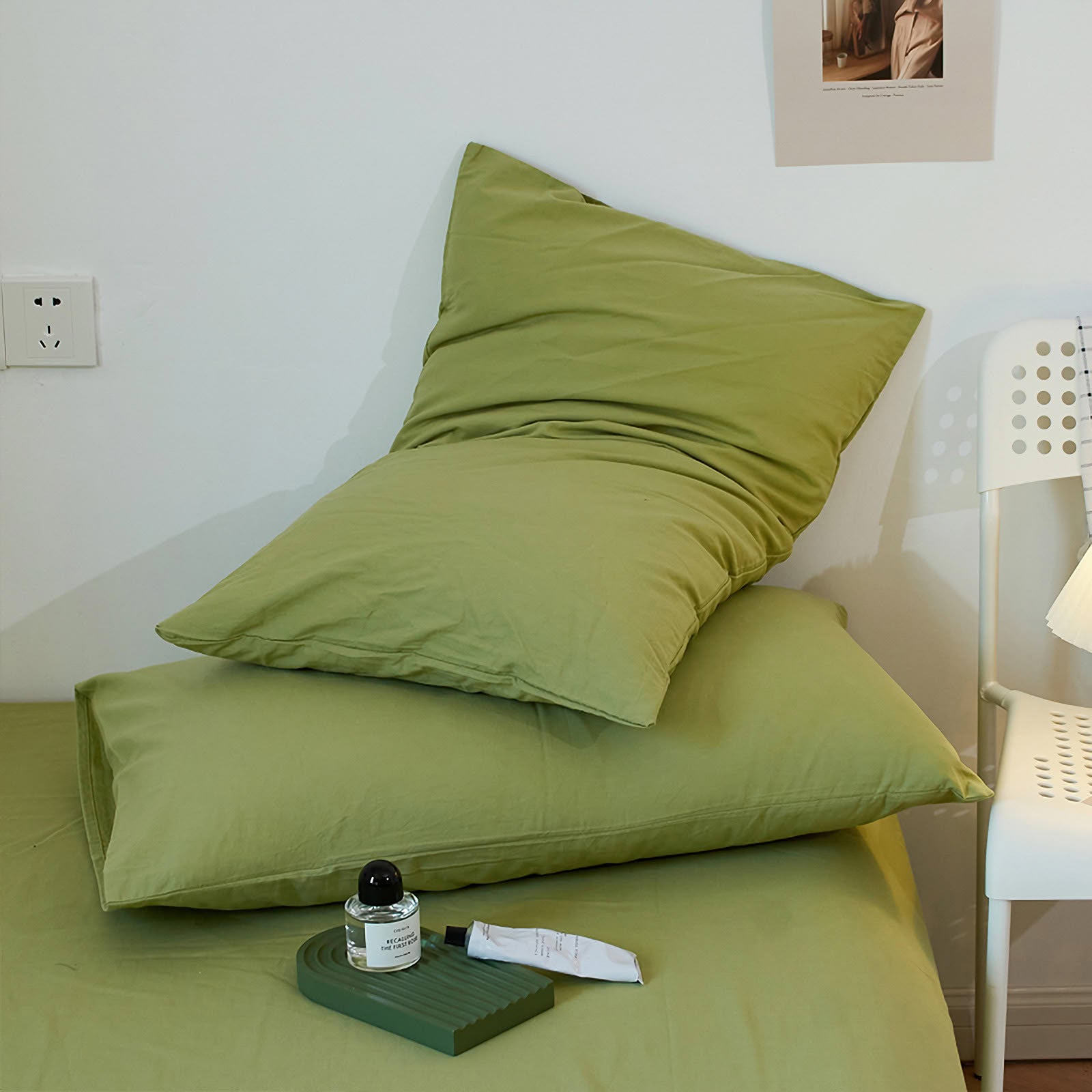 Soft washed cotton solid pillowcase in a minimalist cozy bedroom – RoomDen