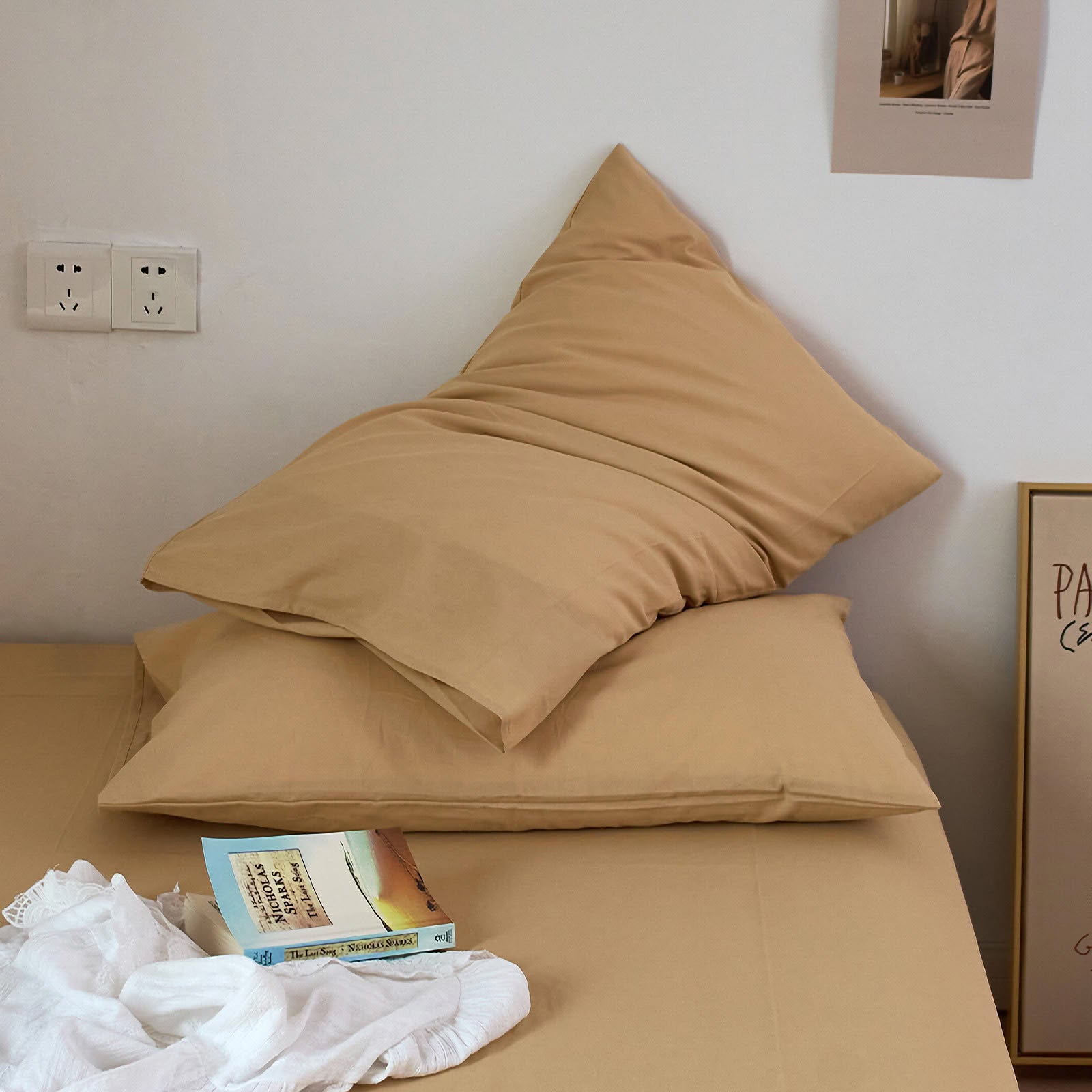 Soft washed cotton solid pillowcase in a minimalist cozy bedroom – RoomDen