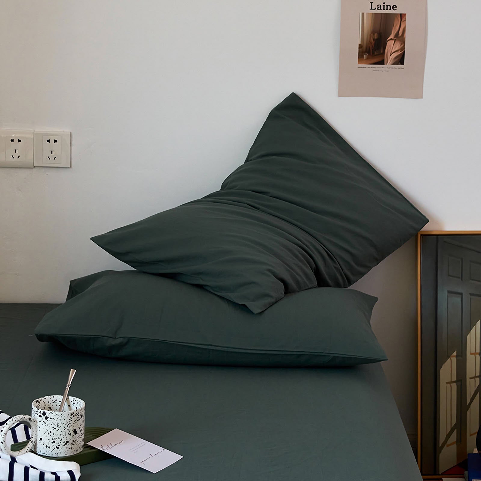 Soft washed cotton solid pillowcase in a minimalist cozy bedroom – RoomDen