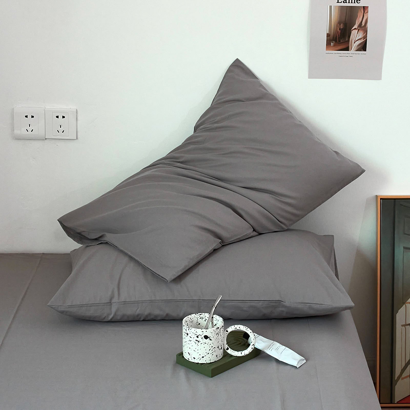 Soft washed cotton solid pillowcase in a minimalist cozy bedroom – RoomDen