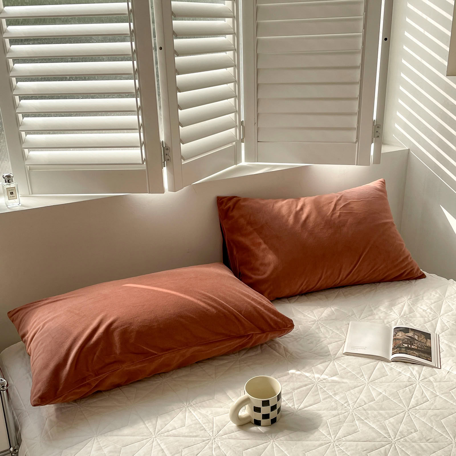 Soft flannel fleece pillowcase in a cozy minimalist bedroom setting – RoomDen