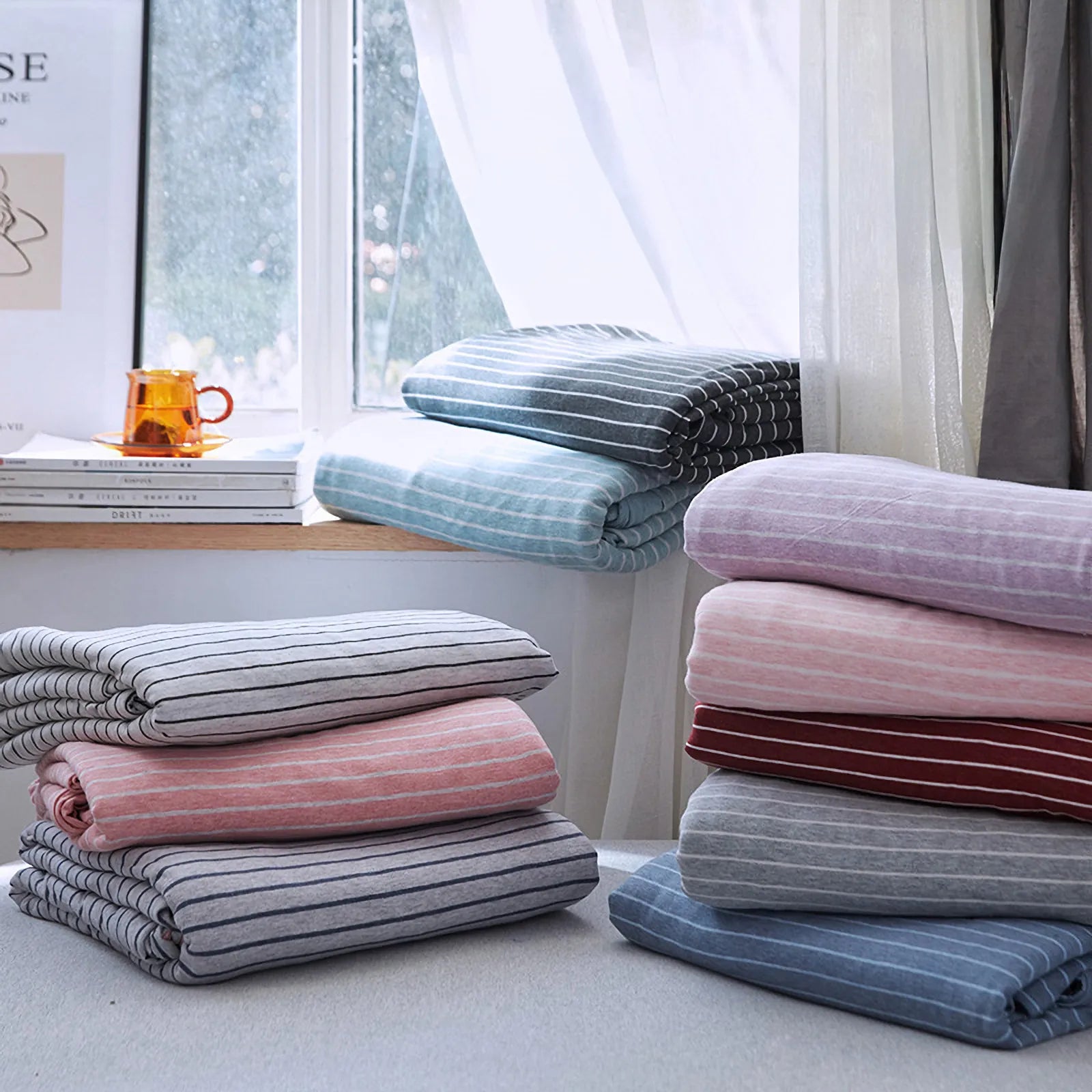 Striped washed cotton duvet cover set folded view – RoomDen