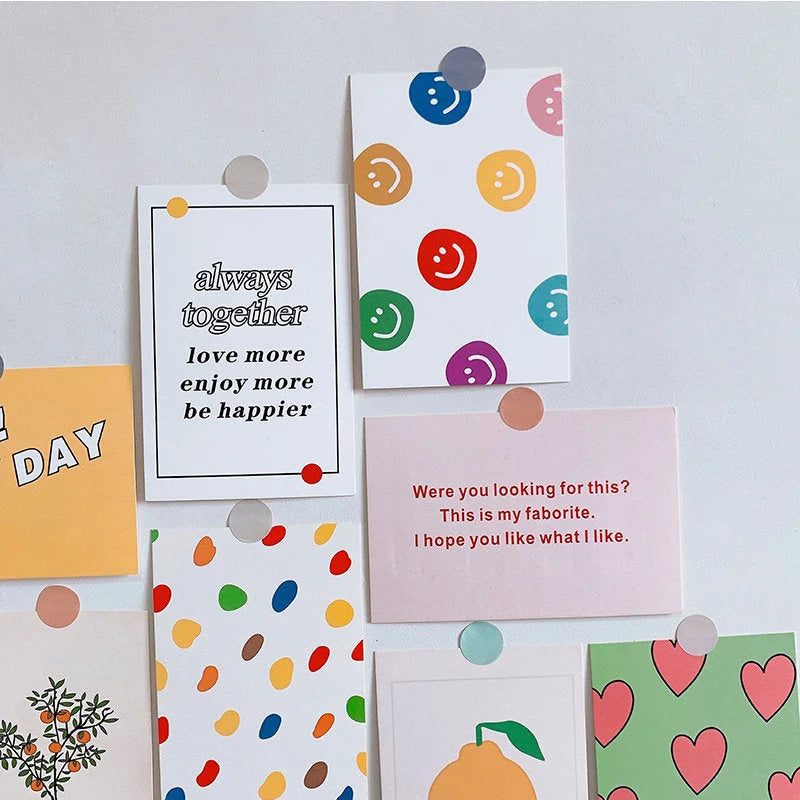 Close-up of the Indie-style wall collage kit, featuring cards with smiley faces and positive quotes like 'always together'.