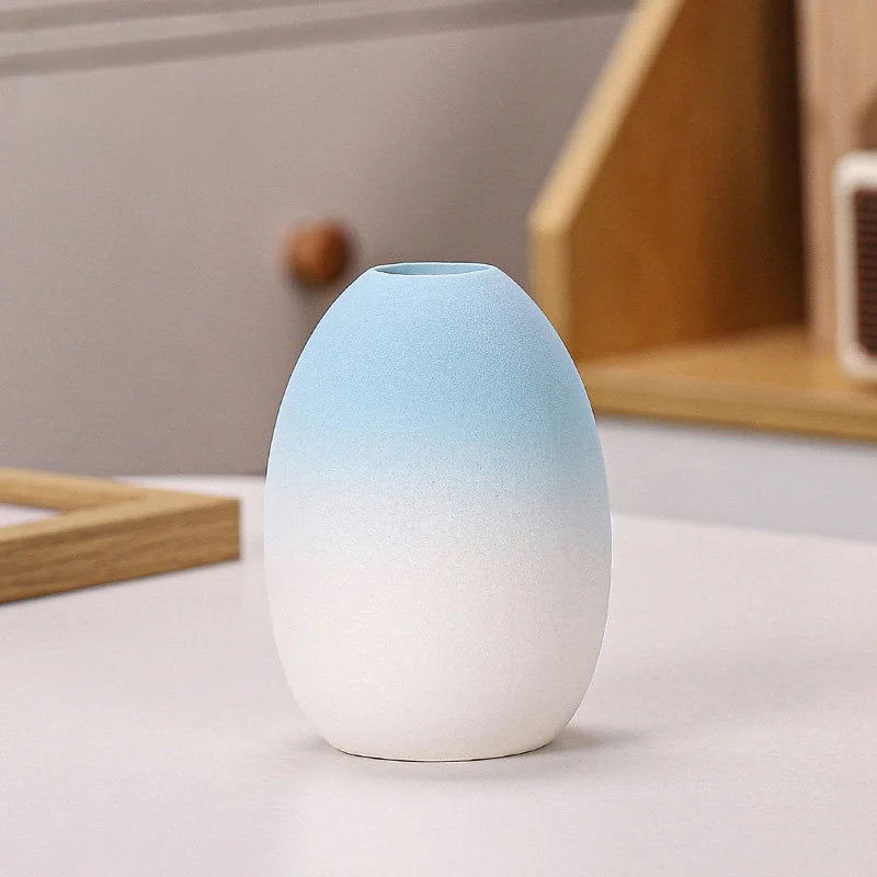 Blue Ombre egg-shaped frosted ceramic vase on a white surface - RoomDen.