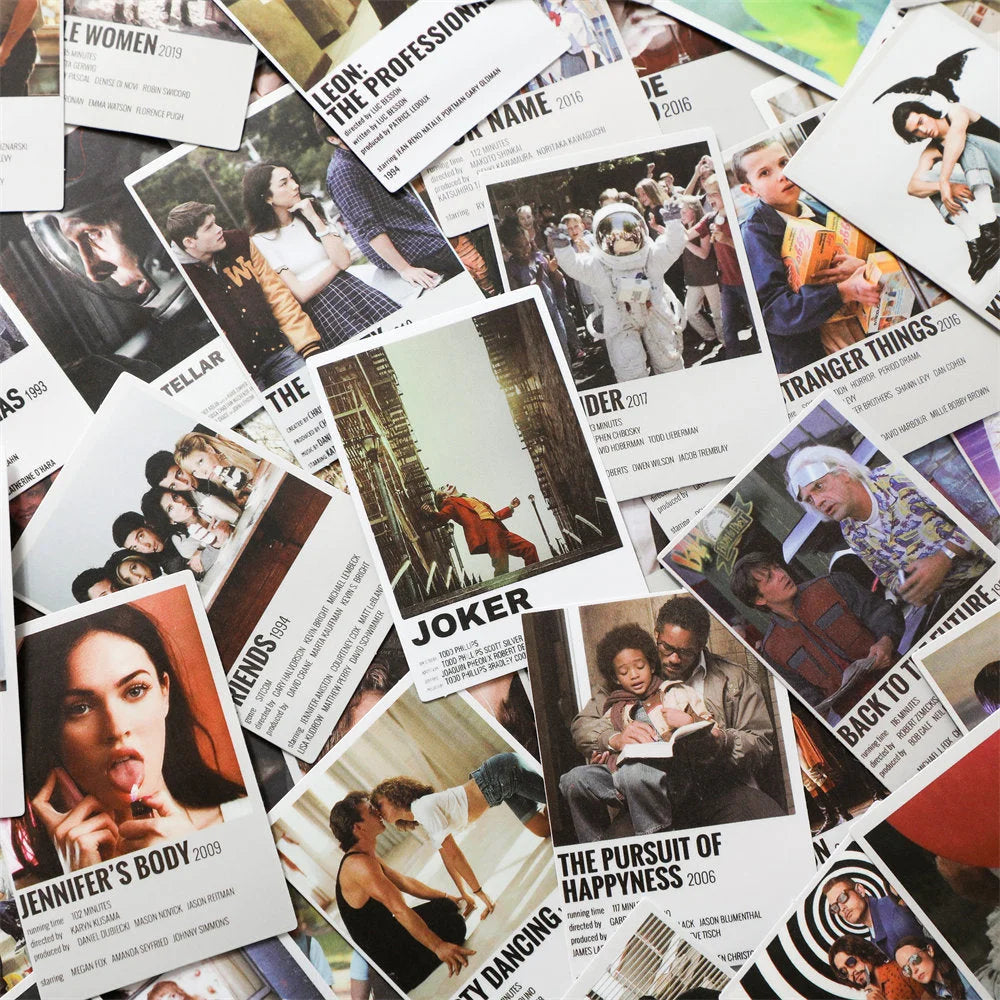 A large, scattered collection of minimalist movie and TV show poster prints, including Joker and Stranger Things, for an indie wall collage kit - RoomDen.