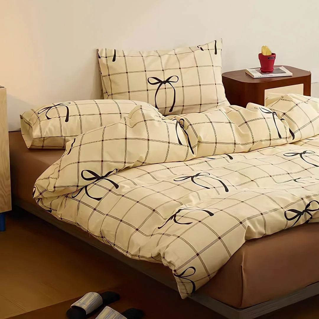 Lifestyle shot of the full bow plaid bedding set, creating a cozy bedroom atmosphere. - RoomDen