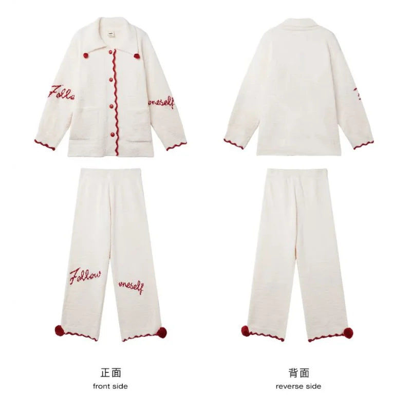 Flat lay of the Cream White embroidered fleece pajama set showing the front and reverse sides. - RoomDen