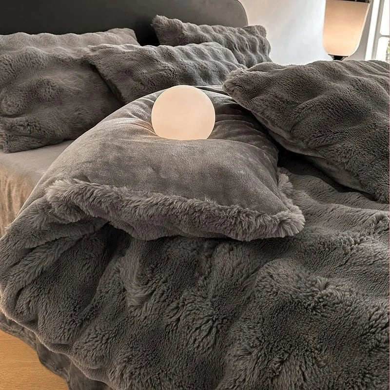 Close-up of the fluffy edge of a pillow sham from the Charcoal Grey bedding set. - RoomDen