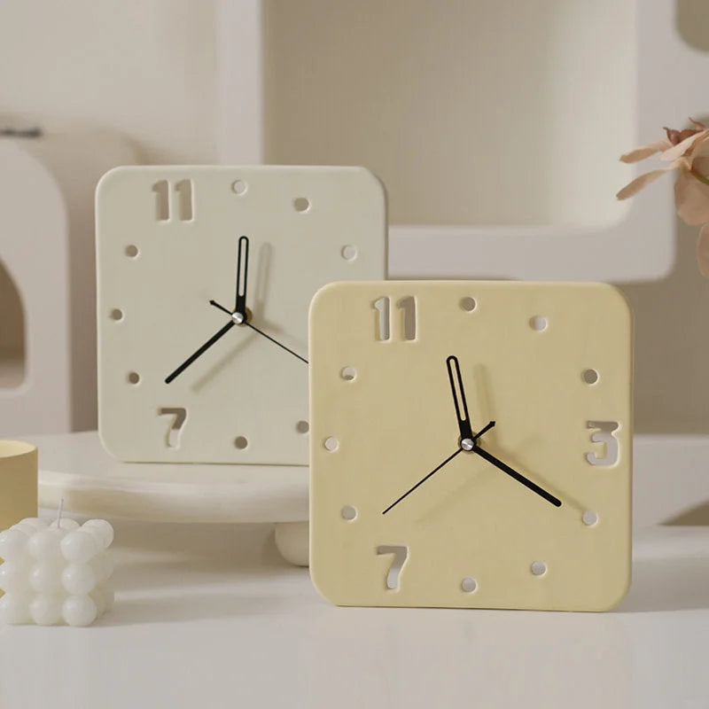 Cream and Butter Yellow Minimalist Cutout Ceramic Table Clocks on a white desk - RoomDen.