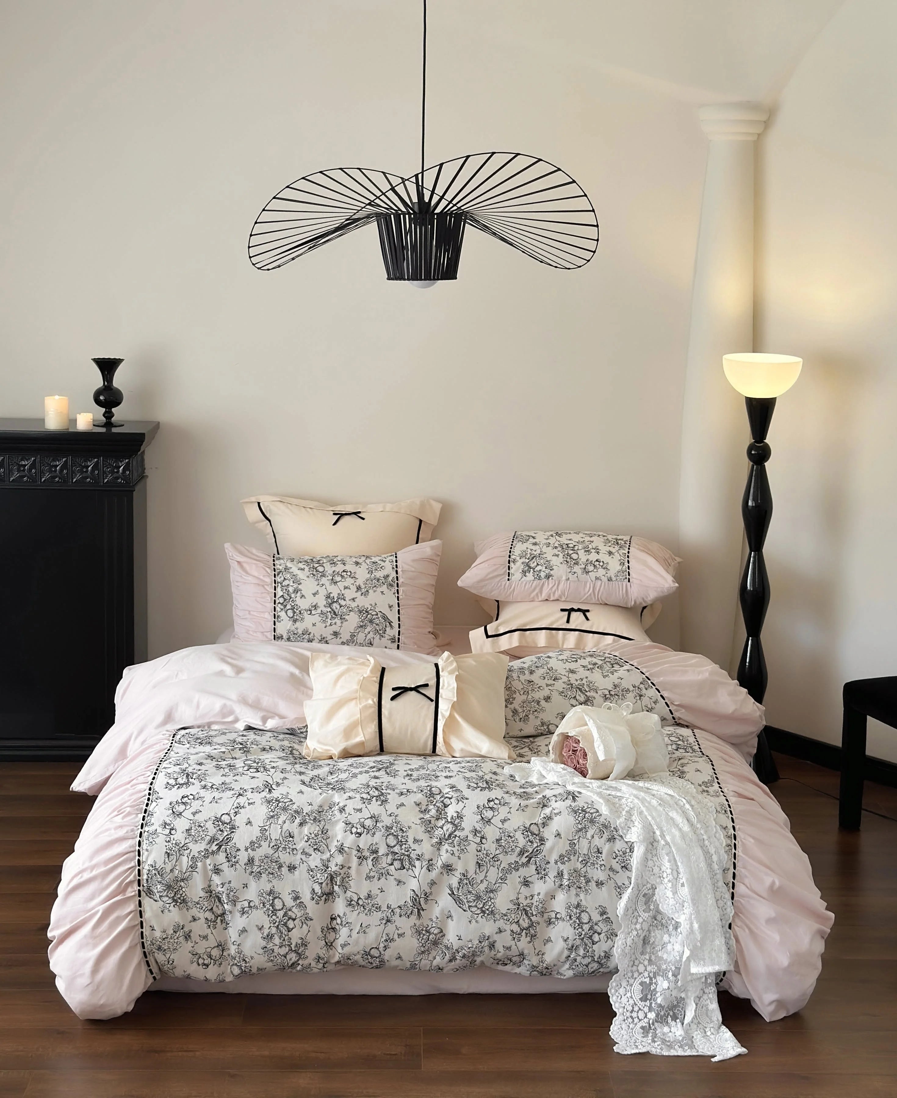 Full bedroom view of the Ruffled Botanical Toile Bedding Set in the Pink Toile color variant. - RoomDen