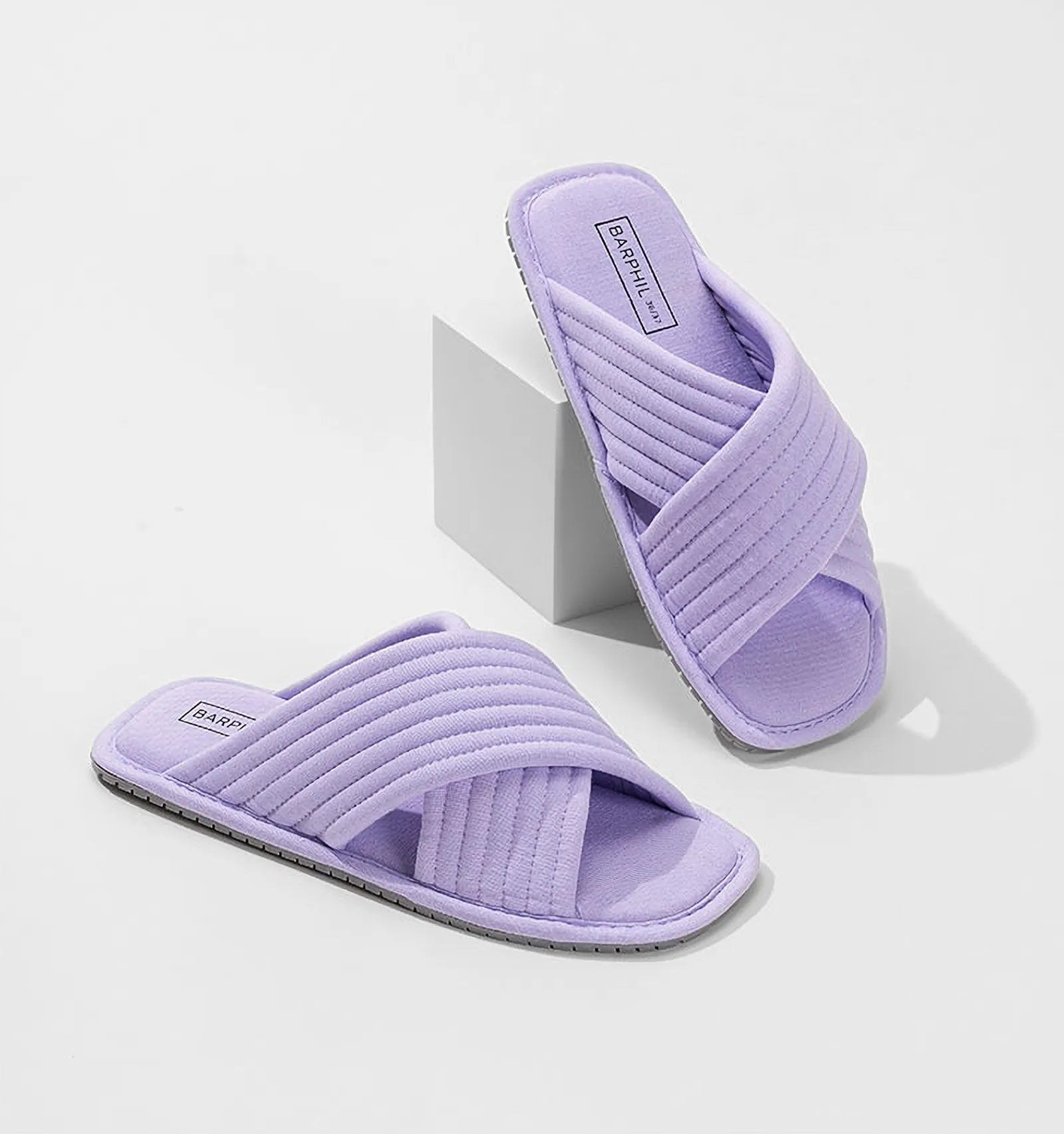 Pair of Lavender Quilted Cotton House Slippers displayed on white block