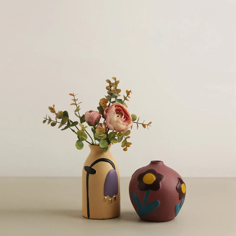 Creamy Beige and Dusty Mauve floral vases displayed together, one holding pink flowers. - RoomDen