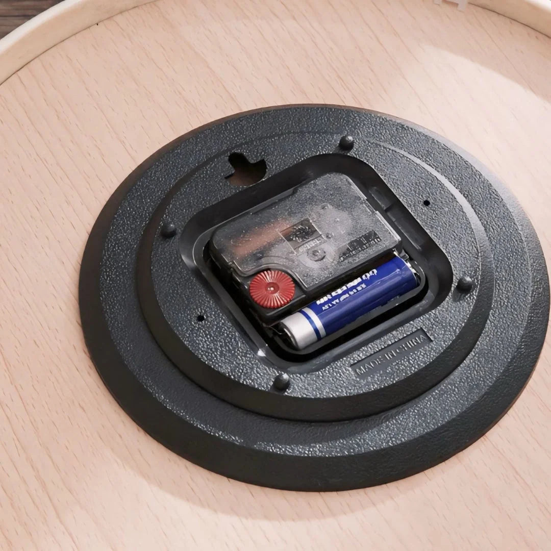 Back view of the wall clock showing the battery-operated quartz movement.