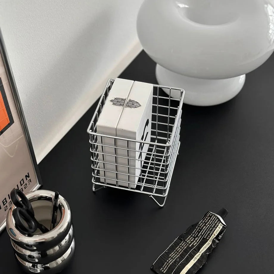 Top-down view of the silver metal grid organizer, showing its square shape and contents - RoomDen.