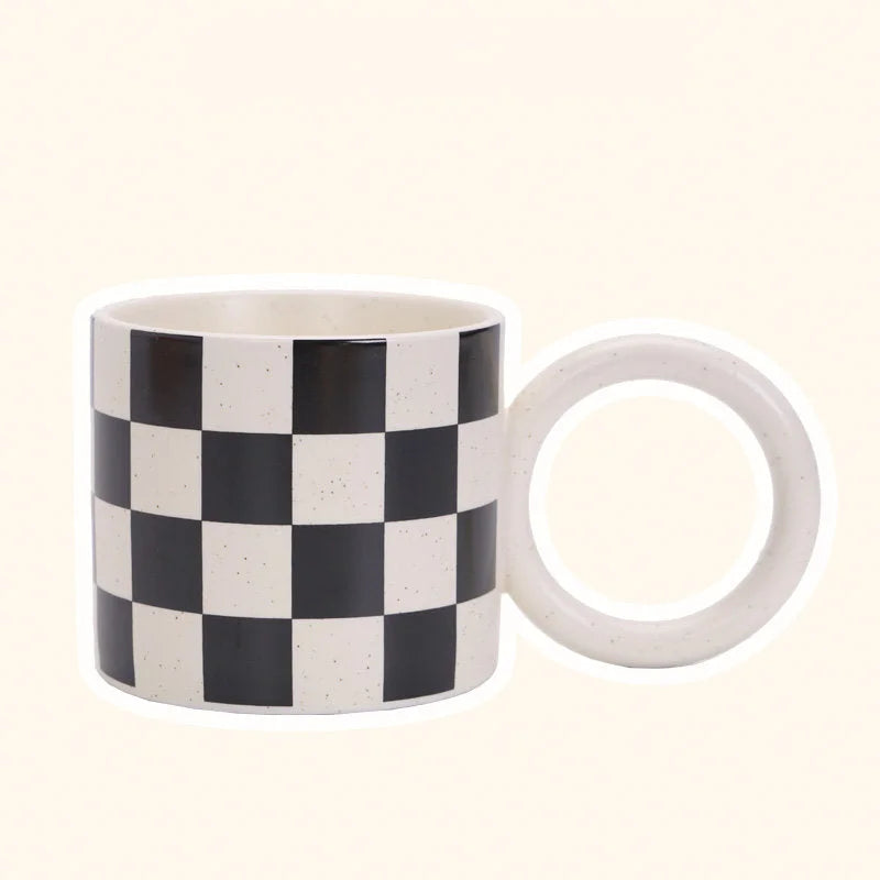 Front view of the Black Checkered Ceramic Mug with an Oversized Handle. - RoomDen