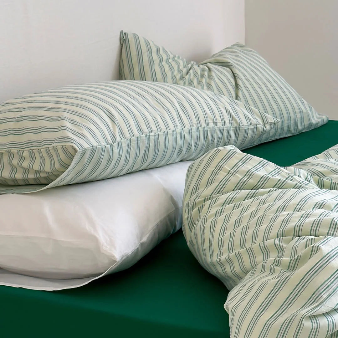Detail Shot of Washed Cotton Texture on Green Striped Pillows - RoomDen