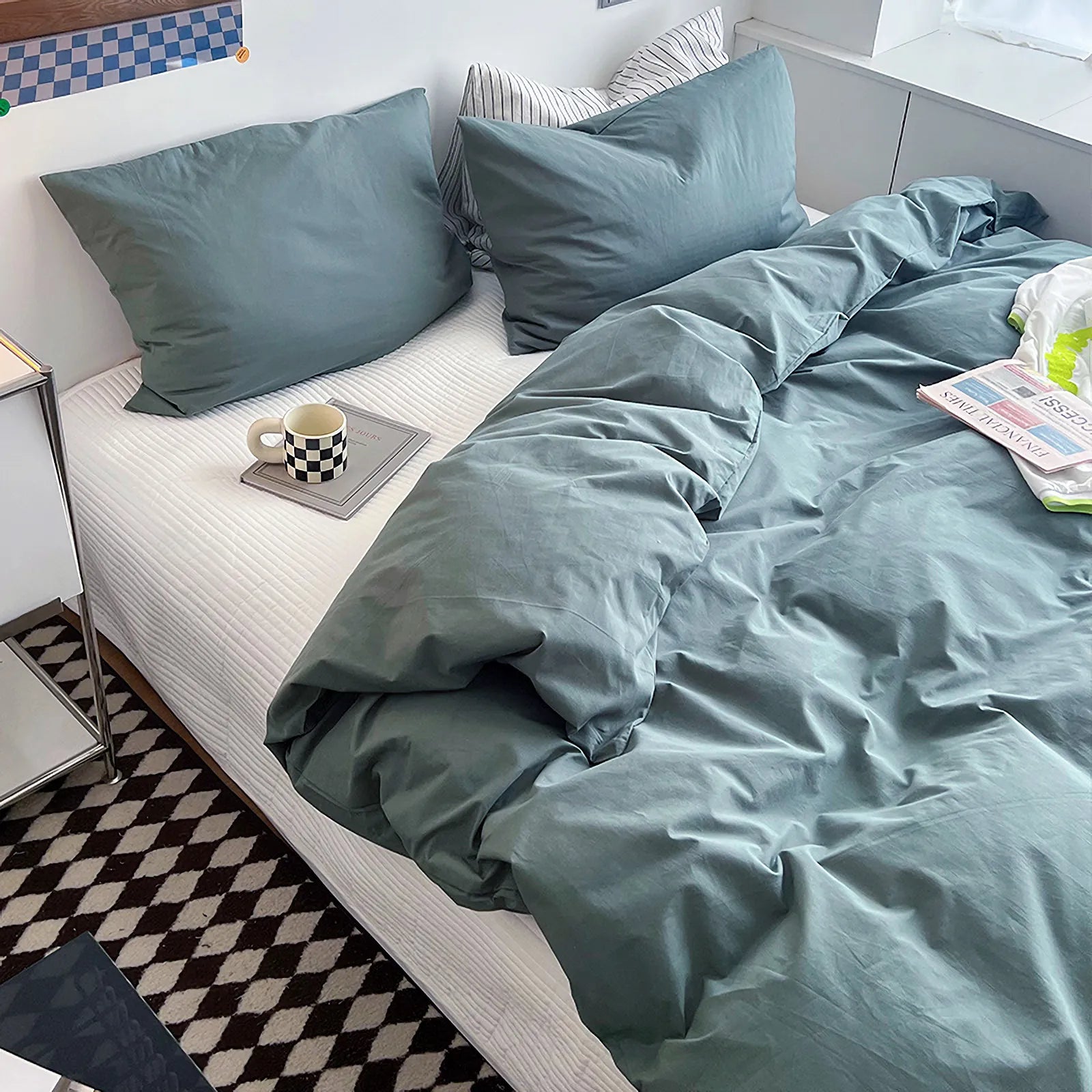 Soft pastel solid washed cotton duvet cover and pillowcases in a cozy minimalist bedroom – RoomDen