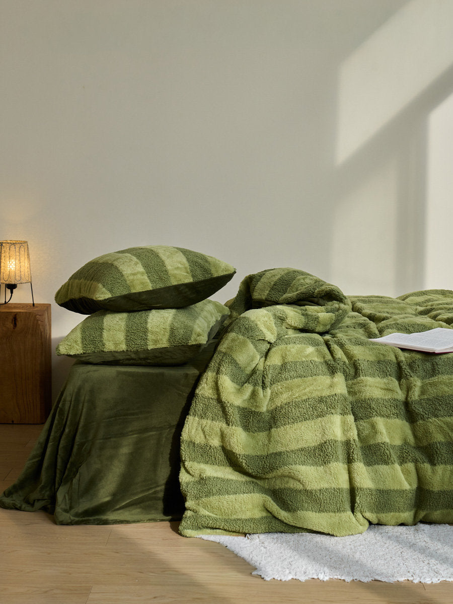 Olive green striped bedding set with flannel fleece texture and natural light - RoomDen