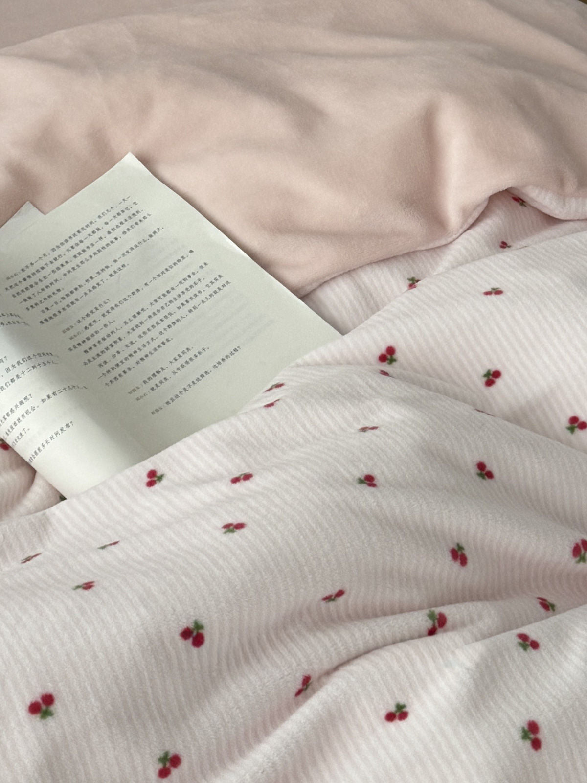 Pink flannel bedding set with cherry embroidery and open book aesthetic shot - RoomDen
