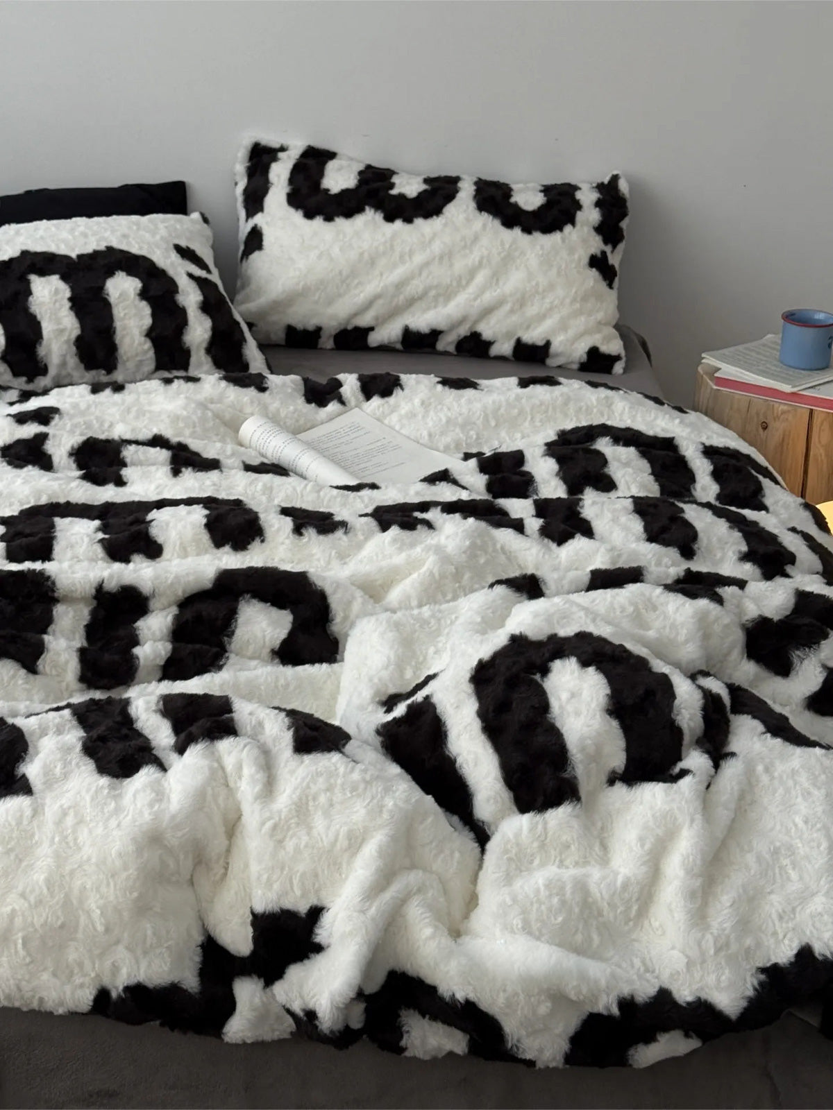 Full view of Plush Typography Flannel Fleece Bedding Set on bed RoomDen