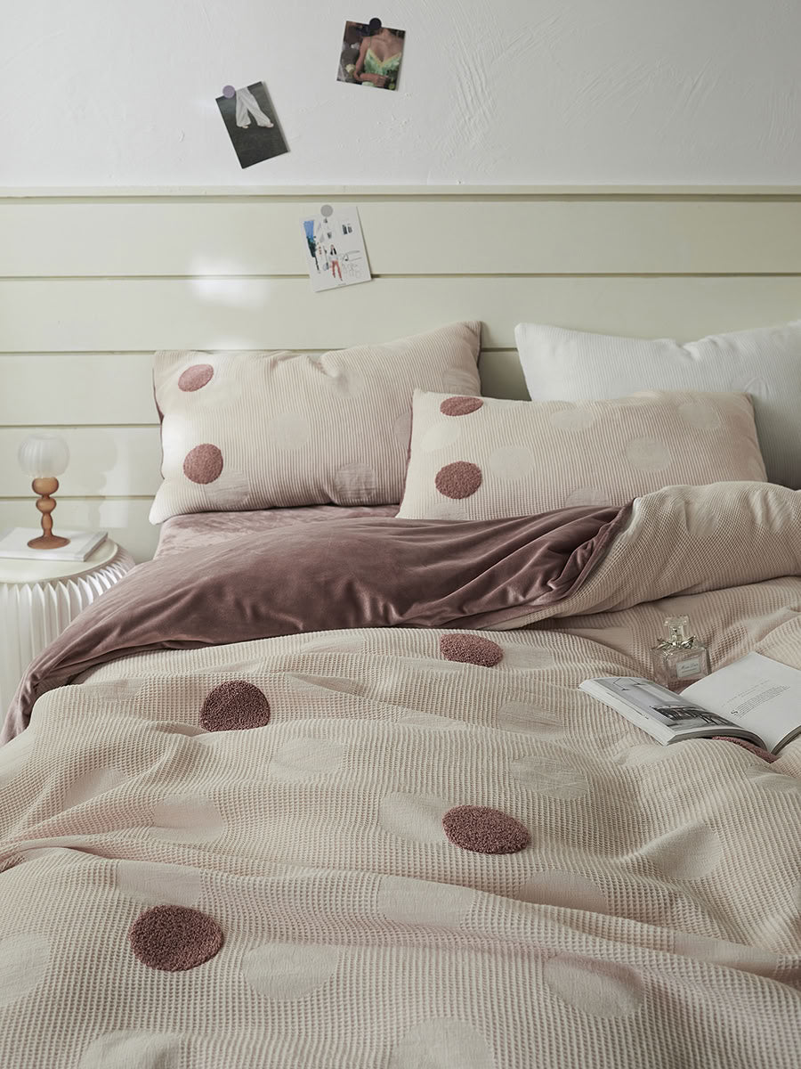 Mauve pink polka dot waffle cotton and flannel fleece bedding set on bed – RoomDen