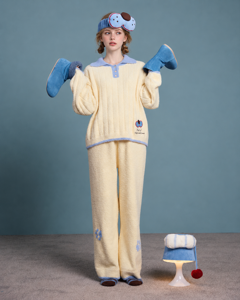 Plush Paw Print Pajama Set – cream yellow and blue front view with raised blue slippers - Roomden