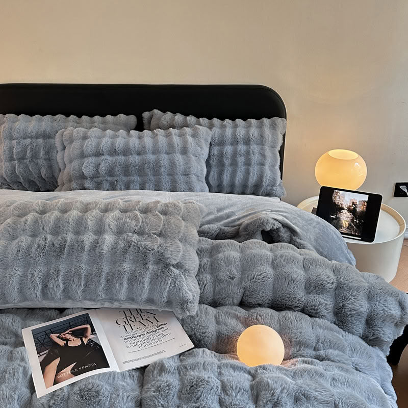 Luxurious grey blue fluffy bedding creating a calm modern bedroom – RoomDen