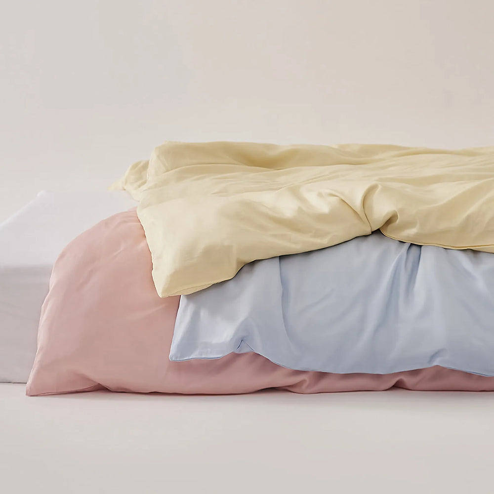 Silky cooling Tencel duvet cover set with a soft minimalist look and smooth draped texture – RoomDen