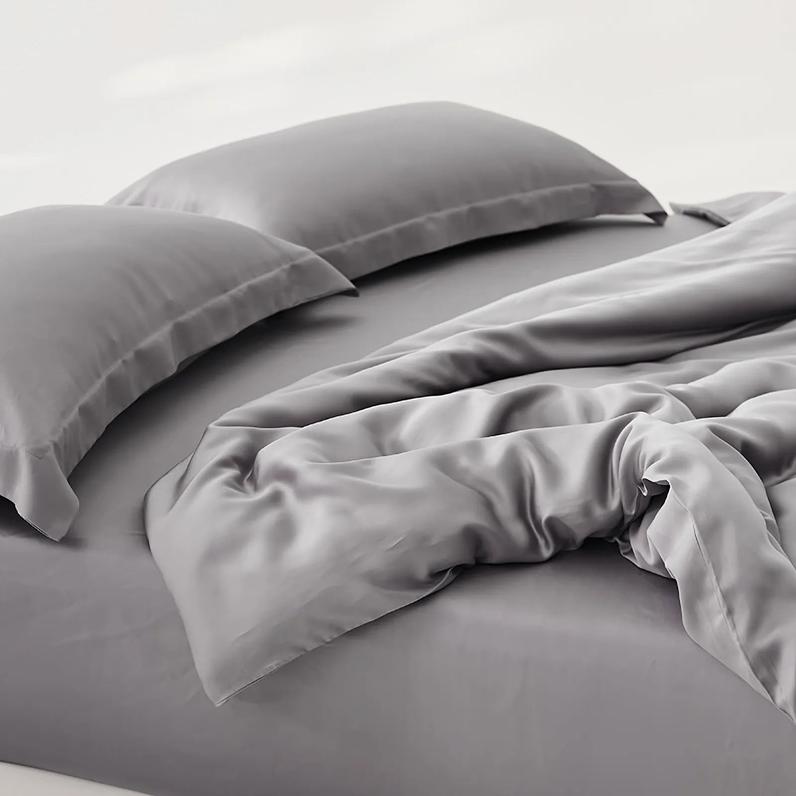 Silky cooling Tencel duvet cover set with a soft minimalist look and smooth draped texture – RoomDen