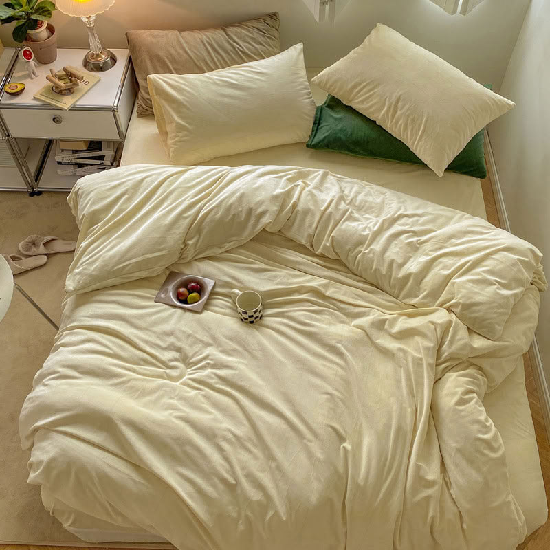 Solid Cream Ivory velvet bedding set with soft plush texture and minimalist cozy bedroom scene - RoomDen