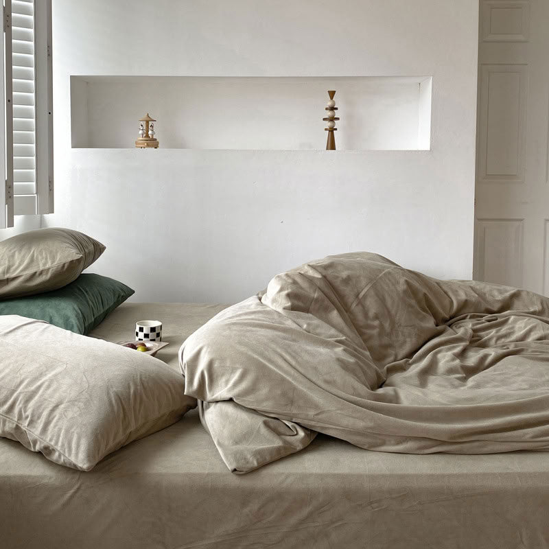 Solid Taupe velvet bedding set with soft plush texture and minimalist cozy bedroom scene - RoomDen