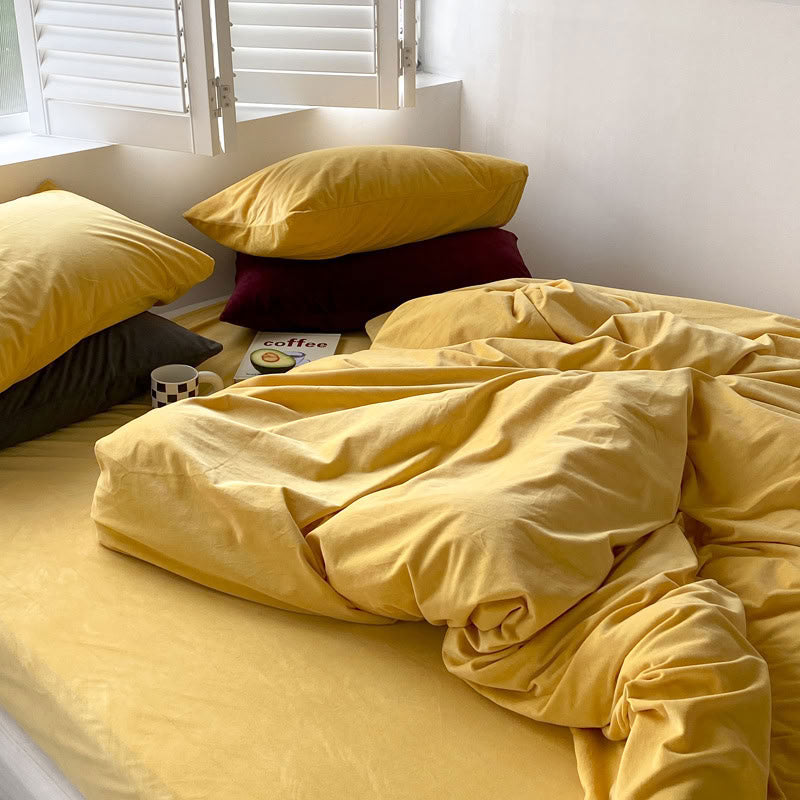 Solid Yellow velvet bedding set with soft plush texture and minimalist cozy bedroom scene - RoomDen