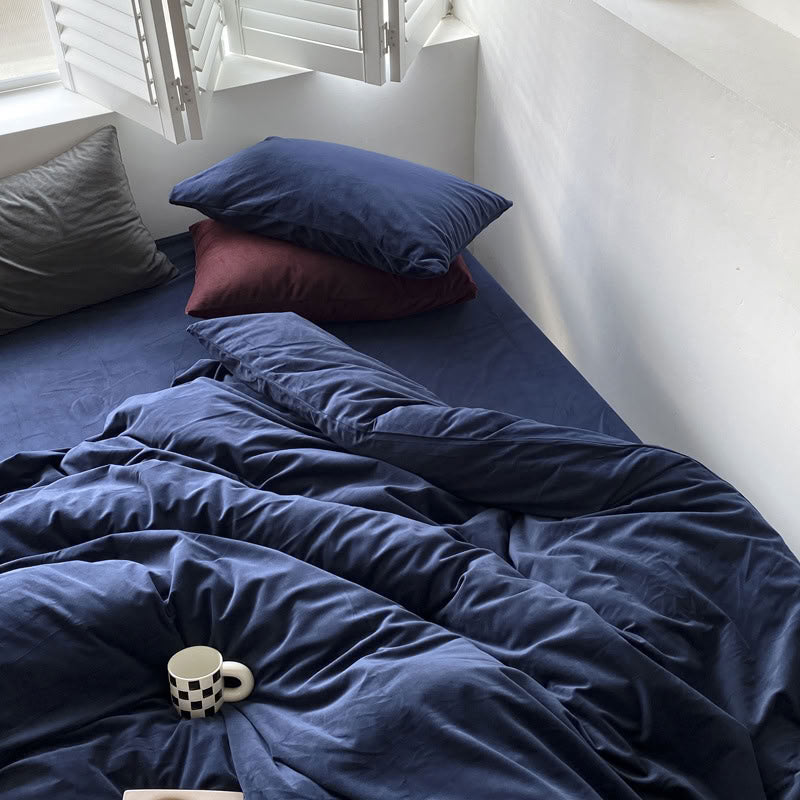 Solid Navy Blue velvet bedding set with soft plush texture and minimalist cozy bedroom scene - RoomDen