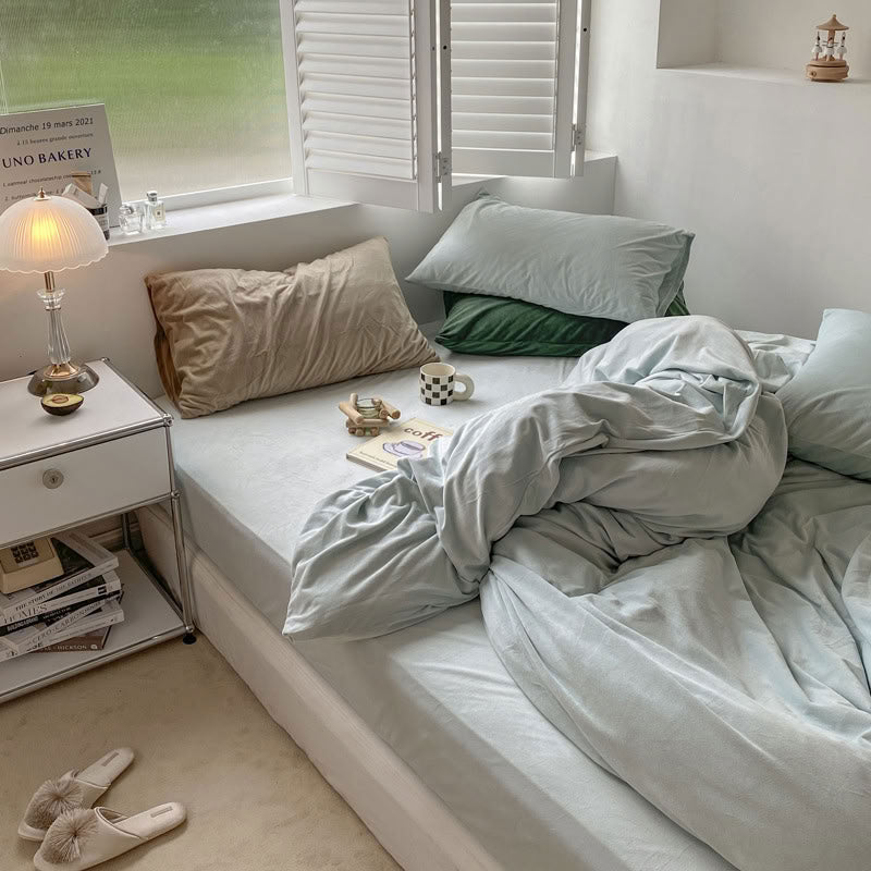 Solid Light Blue velvet bedding set with soft plush texture and minimalist cozy bedroom scene - RoomDen