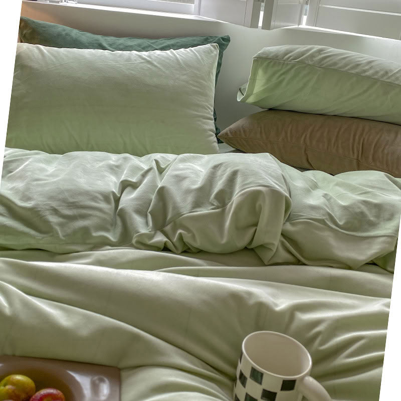 Solid Mint Green velvet bedding set with soft plush texture and minimalist cozy bedroom scene - RoomDen