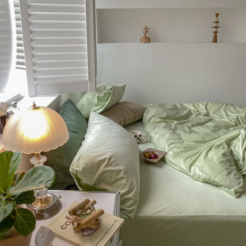 Solid Mint Green velvet bedding set with soft plush texture and minimalist cozy bedroom scene - RoomDen